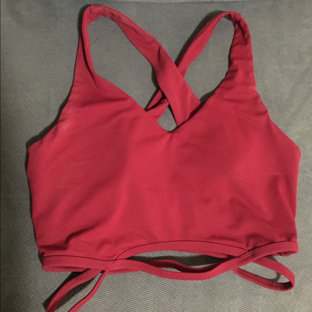 Deep red fabletics sports bra.
